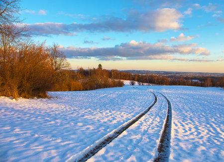 Evening winter landscape view from Bohemian and Moravian highland near Velke Mezirici town, Czech Republicの写真素材