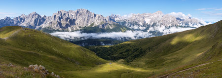 panoramic view of the Sexten dolomites mountains or Dolomiti di Sesto from the Carnian Alps mountains, Italyの写真素材