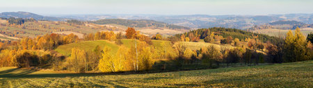 autumn panorama from bohemian and moravian highland, view from Konikov Vecov village, Zdarske vrchy, Czech Republicの写真素材