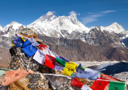 view of Mount Everest, Lhotse and Makalu with buddhist prayer flags, Mount Everest seen from Renjo La pass - Nepal himalaya mountain, Khumbu valleyの写真素材
