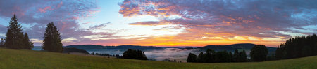 Morning panoramic sunset view of beautiful sky from Bohemian and Moravian highland near Krasne villageの写真素材