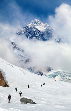 Mount Everest and glacier with hikers, Nepal Himalayas mountainsの写真素材