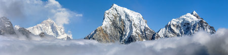 View of mount Makalu (8463 m) from Renjo La pass in the middle of clouds, Way to Everest base camp,...