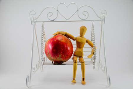 Pomegranates from the backyard look beautiful, but probably will not taste very goodの写真素材