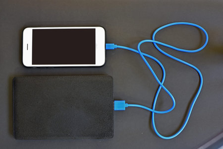 Cell phone charging with Power Bankの写真素材