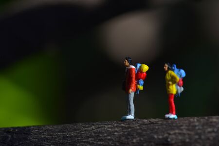 Travel Concept. Men and women with backpack to travel. mini figureの写真素材
