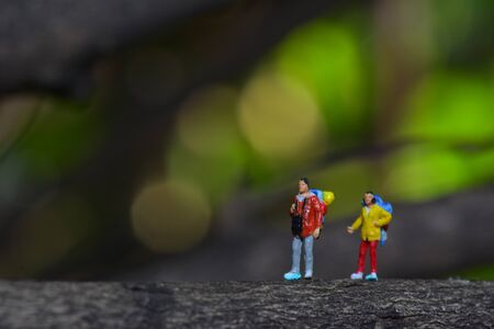 Travel Concept. Men and women with backpack to travel. mini figureの写真素材
