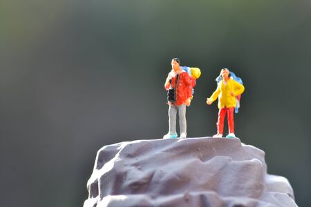 Travel Concept. Men and women with backpack to travel. mini figureの写真素材