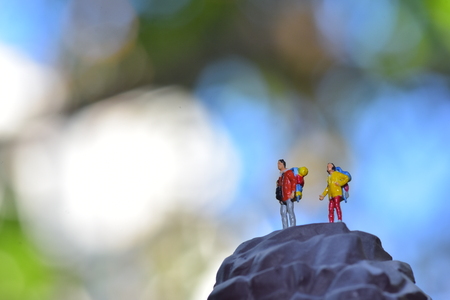 Travel Concept. Men and women with backpack to travel. mini figureの写真素材