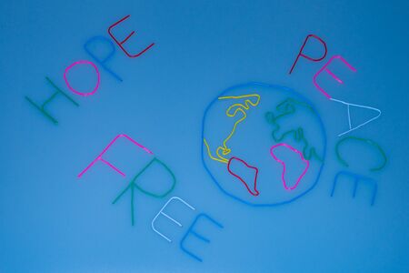 Hand made earth with message - peace, hope, free, Earth made from thin wireの写真素材