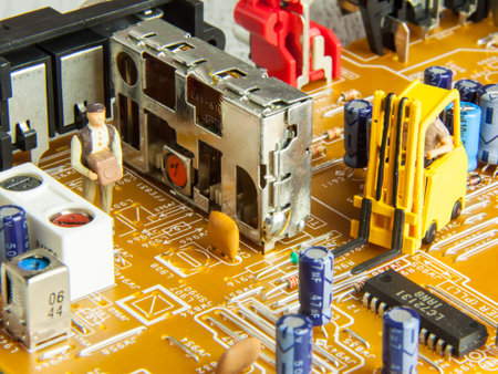 Printed circuit board with figurine of working man, detail