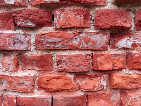 Old brick wall texture. Weathered wall surface. Grungy orange brickwall. Red stonewall background....
