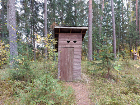 wooden toilet house in the forest