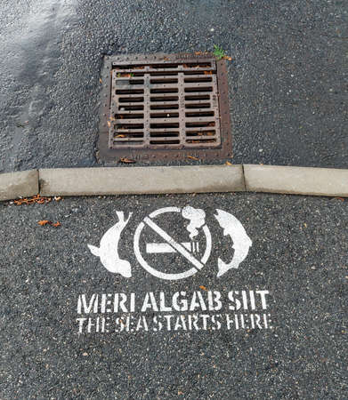 A warning not to smoke cigarettes. we poison the sea and its inhabitants. Estoniaの写真素材