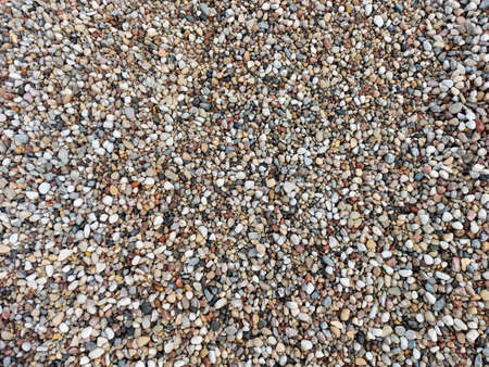 Multi-colored pebbles, medium-sized stones. Close-up view from above.の写真素材