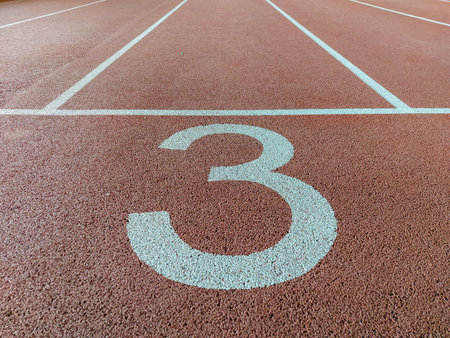 Number three third 3 on the start of a running track - check my portfolio for other numbers