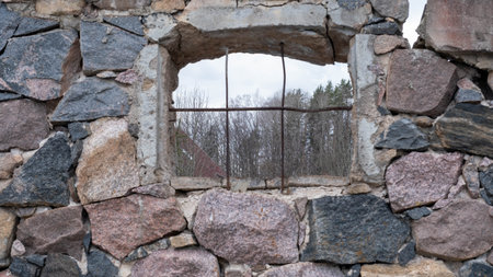 Window in the ancient stone wall white isolated.の写真素材