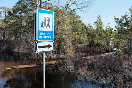 Tuhu Nature Tuhu Nature Walking Trail. Indication of the direction of the walk, a sign in the swamp of a wooden footbridge. Estoniaの写真素材
