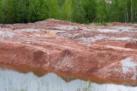 Red clay quarry. Clay quarry. Earth rocks are digging for building materials. Beautiful natural...