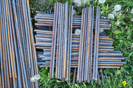 Metal fittings for reinforced concrete. Main construction materials. Background and rusty iron...