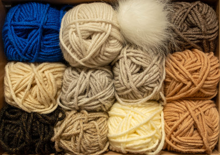 Close up of yarn balls. rainbow colors. Yarn for knitting. Skins of yarn. Knitting needles, colorful...