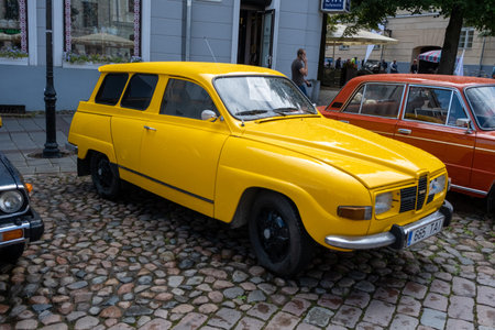 Tartu, Estonia - July 16, 2022: Old retro cars in the center of the old town. a sunny summer day...