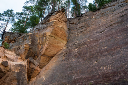 Scenic landscape of the Gauja river. Sandy stones on the shore. Summer nature in Latvia. Gaujas national park.の写真素材