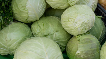 There is a lot of fresh healthy cabbage on the market, a delicious dietary product.