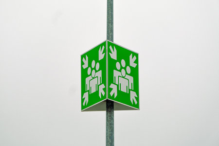 Meeting or gathering place sign on a very light sky backgroundの写真素材