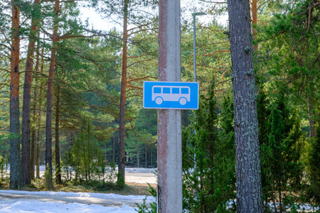 Blue and white bus parking sign with bus iconの写真素材
