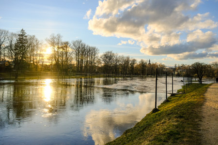 Early spring in Valmiera. Gauja river flooded. Nature in Europe early spring. The river has overflowed its banksの写真素材