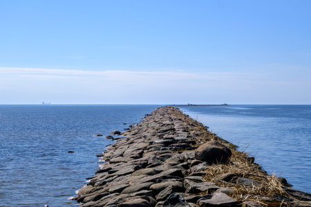 An old stone pier in Parnu Bay. The length is about two kilometers. in the northeastern part of...