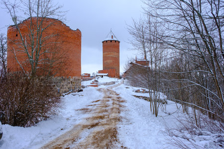 Medieval Turaida Castle complex in winter. Red brick buildings. in the Vidzeme region of Latvia. Gaujas national parkのeditorial素材