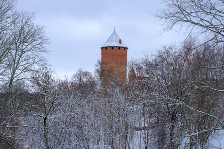 Medieval Turaida Castle complex in winter. Red brick buildings. in the Vidzeme region of Latvia. Gaujas national parkのeditorial素材