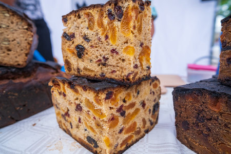 Homemade baked bread with fruit. Cut into large pieces. Homemakers' Market.