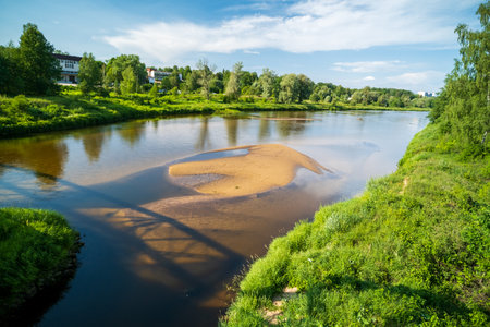 Very low water level in the river. dry summer.の写真素材