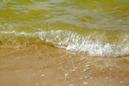 Small waves on the shore of the Baltic Sea in Latvia.