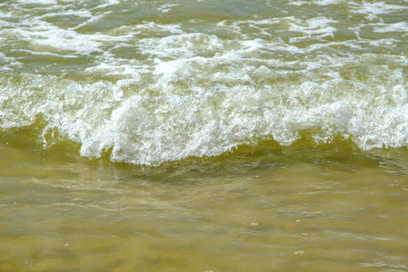 Small waves on the shore of the Baltic Sea in Latvia