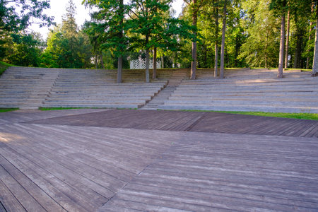 A small outdoor stage made of wooden boards. Latvia, Dikli.