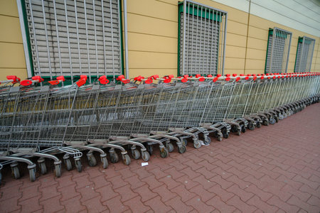 shopping cards together in a line up. trolleys from the supermarket.の写真素材
