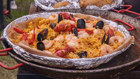 Vibrant seafood paella with mussels and crayfishの写真素材