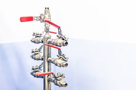 Tube adapter on blue and white background. Wiring of the heating system.