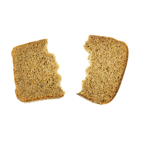 The isolate of two pieces of rye bread lies on a white background.