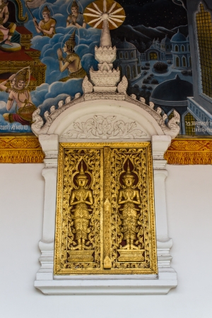 Golden Ornament wooden window of Thai temple in Lamphun, Thailandの写真素材