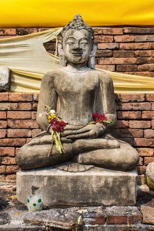 Buddha Statue , Old Chedi in Wat  Phra That Hariphunchaiの写真素材