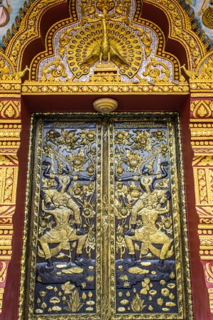 Ornament wooden door of Thai temple in Chiangmai, Thailandの写真素材