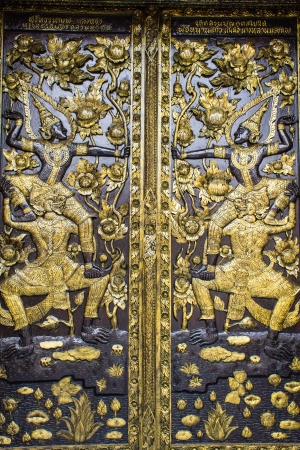 Ornament wooden door of Thai temple in Chiangmai, Thailandの写真素材