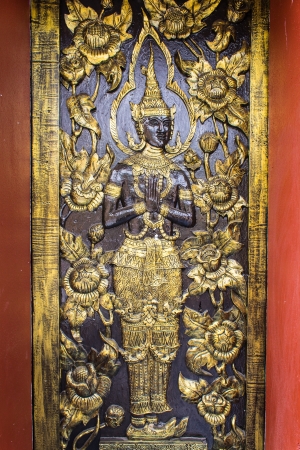 Ornament wooden door of Thai temple in Chiangmai, Thailandの写真素材