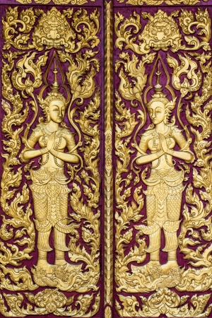 Ornament wooden door of Thai temple in Chiangmai, Thailandの写真素材