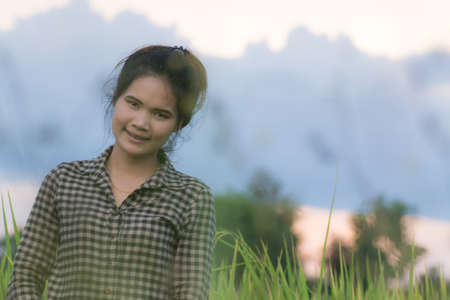 Woman farmer in Green Cornfieldの写真素材
